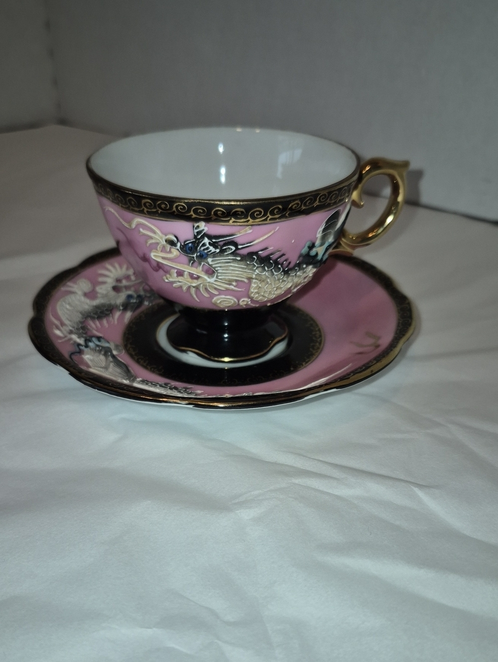 Vintage Pink and Black Raised Embossed Dragon Teacup and Saucer with Gold Trim